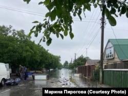 Затопленная улица Первого мая в Голой Пристани